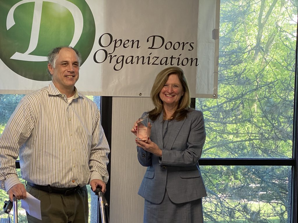 A picture of Eric Lipp with award winner Rosalie
